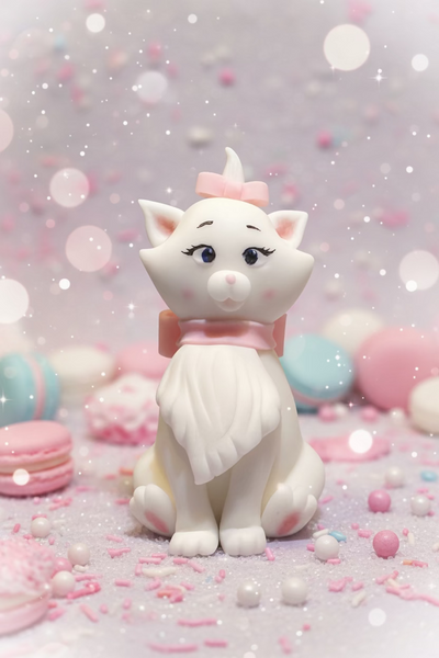 Handcrafted sugar fondant figure of the beloved kitten Marie from Disney's "The Aristocats". Lovingly sculpted with exquisite attention to detail – featuring her iconic snow-white fur, charming pink bows, and bright blue eyes. This elegant cake topper is the perfect addition to birthday cakes, baby showers, or any special celebration for your little princess. Made from high-quality fondant, safe for food contact.